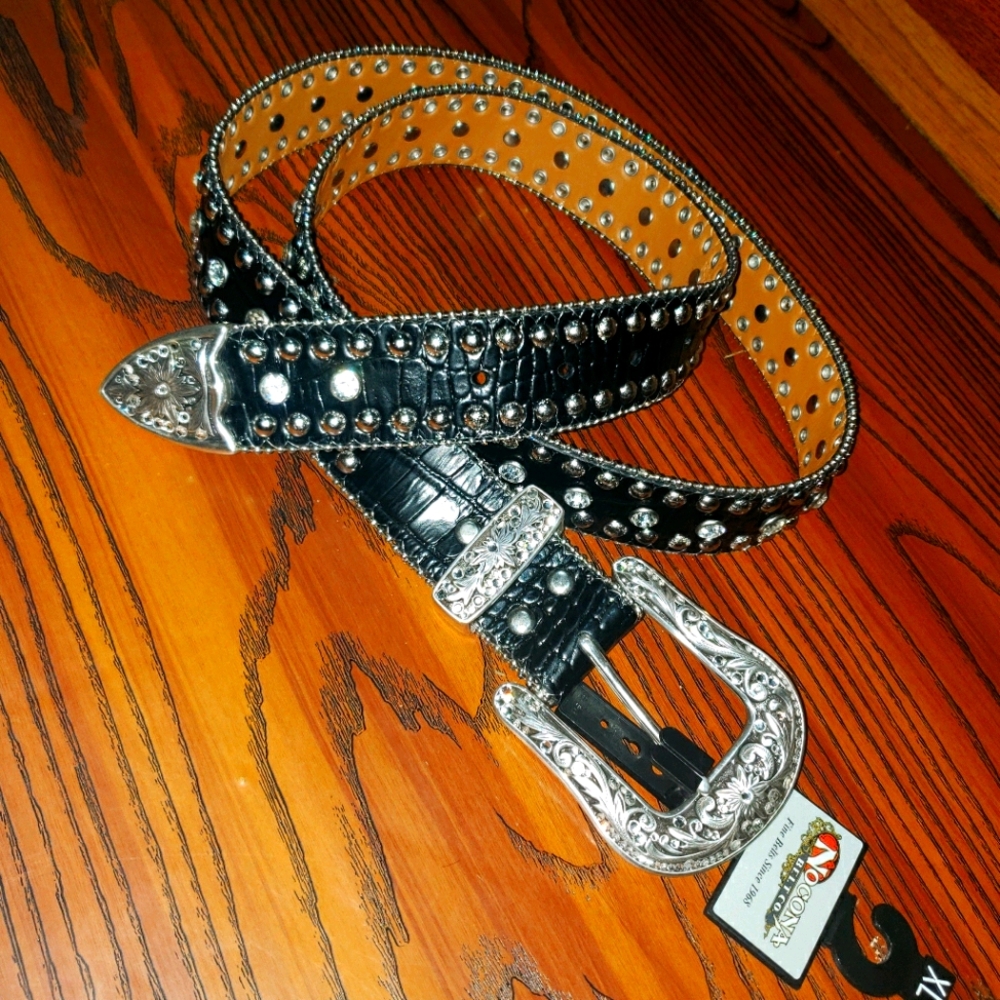 Rhinestone studded black belt.